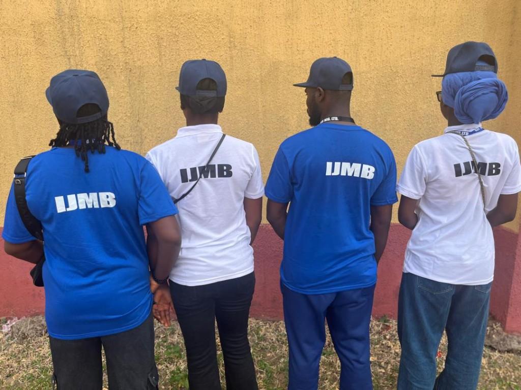 MMCAAT team members wearing IJMB shirts