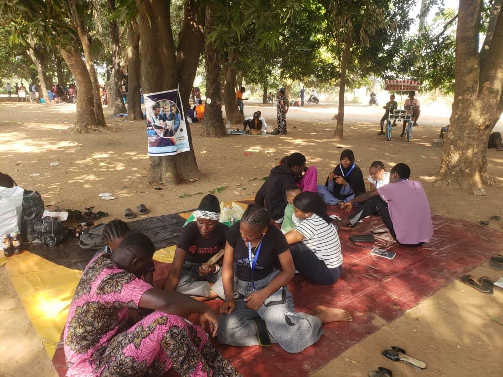 MMCAAT students spending time together at an outdoor tour picnic